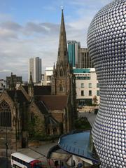 The Bull Ring shopping center with St Martins Church and Selfridges building in Birmingham from the north view