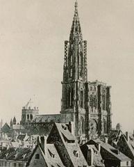 Strasbourg Cathedral facade with intricate Gothic architecture under blue sky