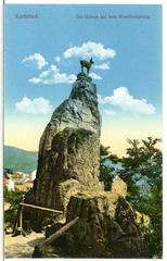 Black and white historical photograph of Karlsbad showing a chamois statue on the Hirschensprung bridge