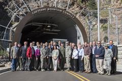 10th Air Force Civilian Leader tour group photo outdoors with military personnel and civilian leaders