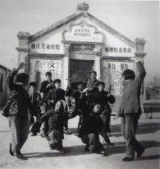 Group photo of students performing a program at Shandong Agricultural College in 1957-1958