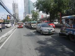 Mandaluyong City skyline along Shaw Boulevard showcasing urban development and high-rise buildings
