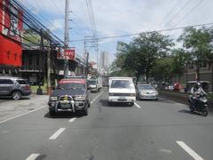 Shaw Boulevard intersection at Ortigas Center near Pasig City with high-rise buildings and busy traffic