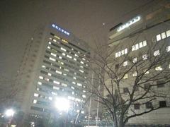 Showa University Hospital illuminated at rainy night