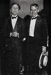Still from the premier showing of the American comedy film The Gold Rush (1925) with Charlie Chaplin and Sid Grauman at Grauman's Egyptian Theatre
