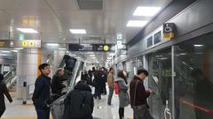 Seokchon Station Line 9 platform for Gaehwa with modern design and clear signage