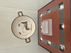 White-ground Attic cup from Delphi with intricate ancient Greek artwork