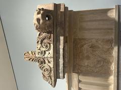 Close-up view of entablature details in Delphi
