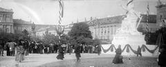 Hungária statue offering a wreath in honor of Emperor Vilmos at Széchenyi tér with the Hungarian Academy of Sciences building on the left