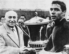 Bologna FC president Renato Dall'Ara and captain Mirko Pavinato holding 1961 Mitropa Cup at Stadio Comunale in 1962