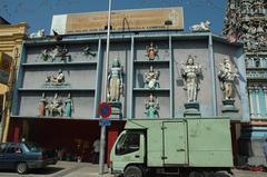 Sri Mahamariamman Temple front view with colorful statues and intricate carvings in Kuala Lumpur