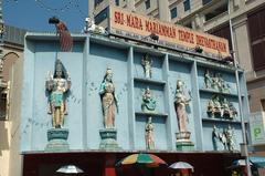 Front view of Sri Mahamariamman Temple in Kuala Lumpur with colorful ornate sculptures