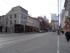 Historic building at southwest corner of Frederick and King with Starbucks signage