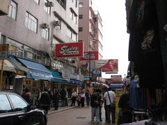Stanley Market street view in Hong Kong with people shopping and colorful stalls