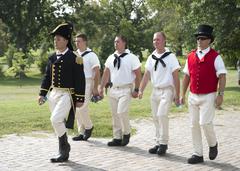 Service members from USS Constitution march in the 200th anniversary celebration of the March of Defenders at Patterson Park Baltimore