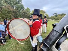 Fort McHenry Guard interacting with children at Patterson Park