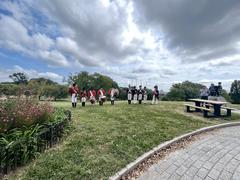 Fort McHenry Guard playing fifes and drums at Patterson Park with visitors and rangers watching