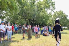 Living historian and Park Ranger talking to visitors at Todd's Inheritance historical site
