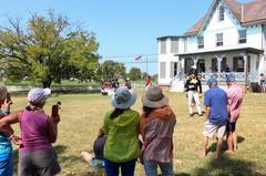 Living historian and Park Ranger engaging with visitors at Todd's Inheritance