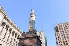 People gathered at the Battle Monument during a solemn ceremony
