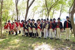 Living historians along the natural shoreline at Todd's Inheritance reenacting historical scenes