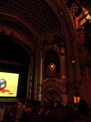 Panoramic view of the ornate auditorium interior of the State Theatre with detailed balconies and seating
