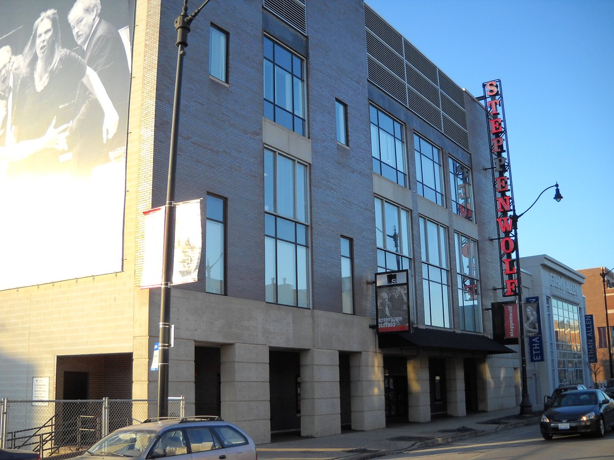 Steppenwolf Theatre exterior at dusk with bright lights and clear sky
