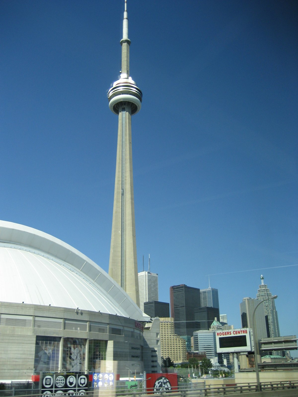Toronto skyline view from the west on the Q.E.W. highway with CN Tower and Rogers Centre