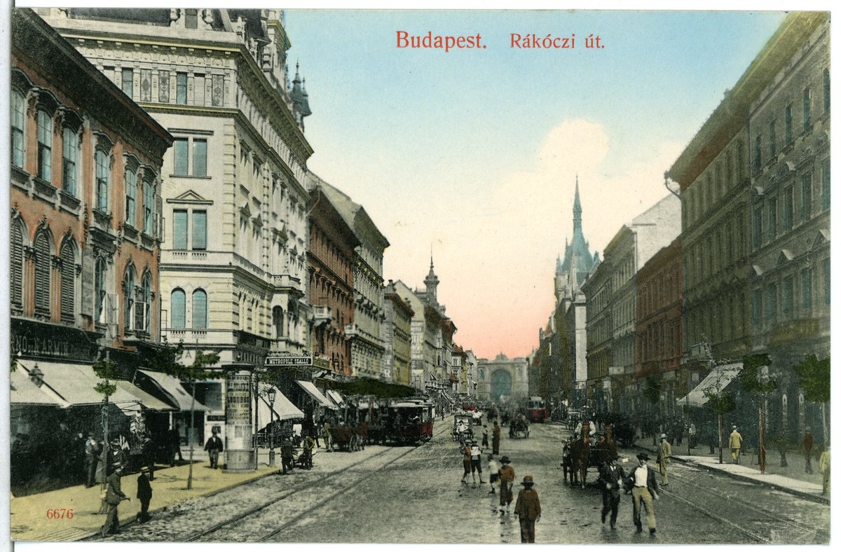 Historical street view of Rakoczi Straße in Budapest with trams and horse-drawn wagons