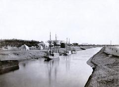 Freshwater canal at Ismailia with surrounding greenery and buildings