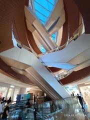 Interior view of Taikoo Hui mall at 383 Tianhe Road in Guangzhou, Guangdong with void escalators in October 2024