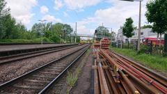 Railway infrastructure works at Bahnhof Grötzingen in May 2024 with construction equipment and workers