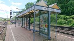 Passenger waiting area at Bahnhof Grötzingen with benches and shelter