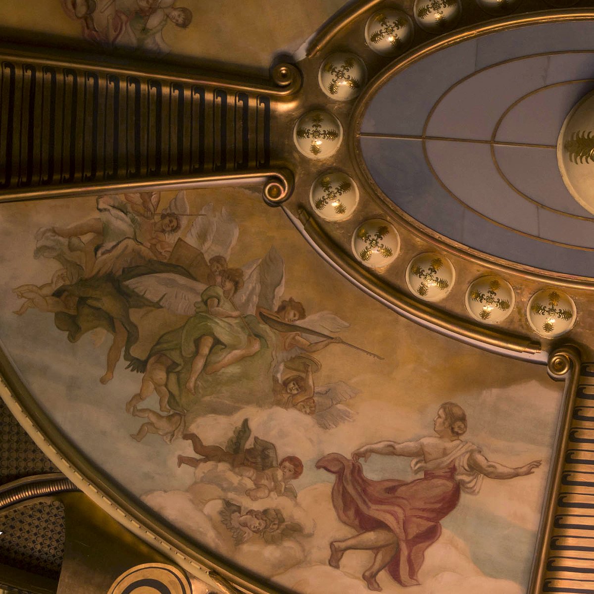 Exterior view of Teatro de la Ciudad Esperanza Iris illuminated at night