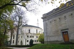 Majestic mosque with traditional Islamic architecture and nearby pavilion