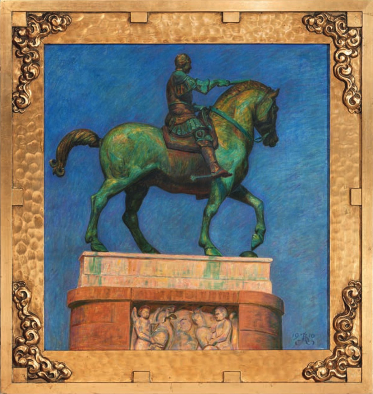Donatello's bronze equestrian statue of condottiere Gattamelata in Padua with green patina under a deep blue sky