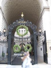 Westward view from sidewalk at Broadway gate of The Apthorp on a cloudy afternoon