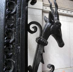 Iron gazelle sculpture behind the western gate of The Apthorp in New York City