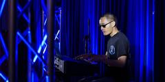 Airman 1st Class Charlie Saechao performing Hikari by Utada Hikaru on keyboard at Peterson's Got Talent 2016