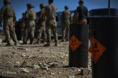 Explosive Ordnance Disposal Airmen receiving training briefing at Fort Carson Airburst Range