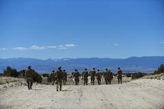 Explosive Ordnance Disposal team members from the 21st and 28th Civil Engineer Squadrons assessing a makeshift runway at Fort Carson Airburst Range