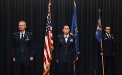 U.S. Air Force Lt. Col. Lisa Guzman receiving Meritorious Service Medal at Peterson Air Force Base