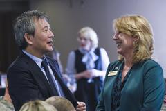 Consul General of Japan in Denver Makoto Ito speaking with Katie Lally from Colorado Springs Mayor’s office at Peterson Club event honoring service members