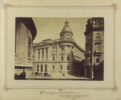 Historic black and white image of Ferenciek tere corner with Reáltanoda utca and Egyetemi Könyvtár in Budapest taken between 1876 and 1884