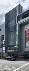 Exterior of Grammy Museum building with modern architecture and clear skies