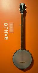 Banjo musical instrument displayed at the Grammy Museum representing country music
