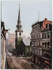 Vintage photochrom postcard depicting women in horse-drawn carriages