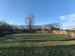 Ruins of the Aquincum Amphitheater in Budapest under a sunny sky