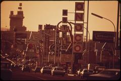 Las Vegas street scene with bustling crowd and neon signs at night