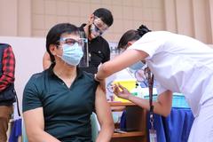 Metropolitan Manila Development Authority Chairman Benjamin Abalos Jr. getting inoculated with CoronaVac at UP-PGH